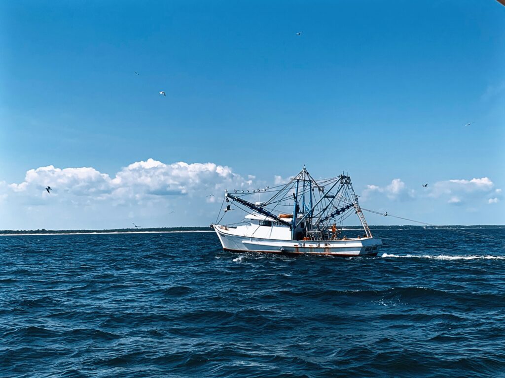 Fishing boat cruising in the Gulf of Mexico near Siesta Key, Florida